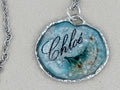 Collier prénom avec inclusion fleur