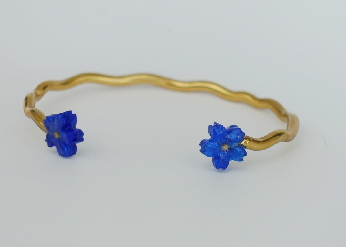 Parure ( un collier, une bague et un bracelet manchette)